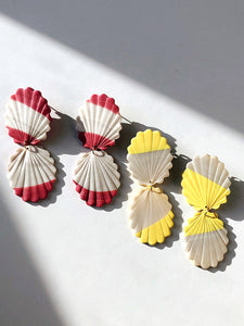 polymer clay earrings in pink and white stripes